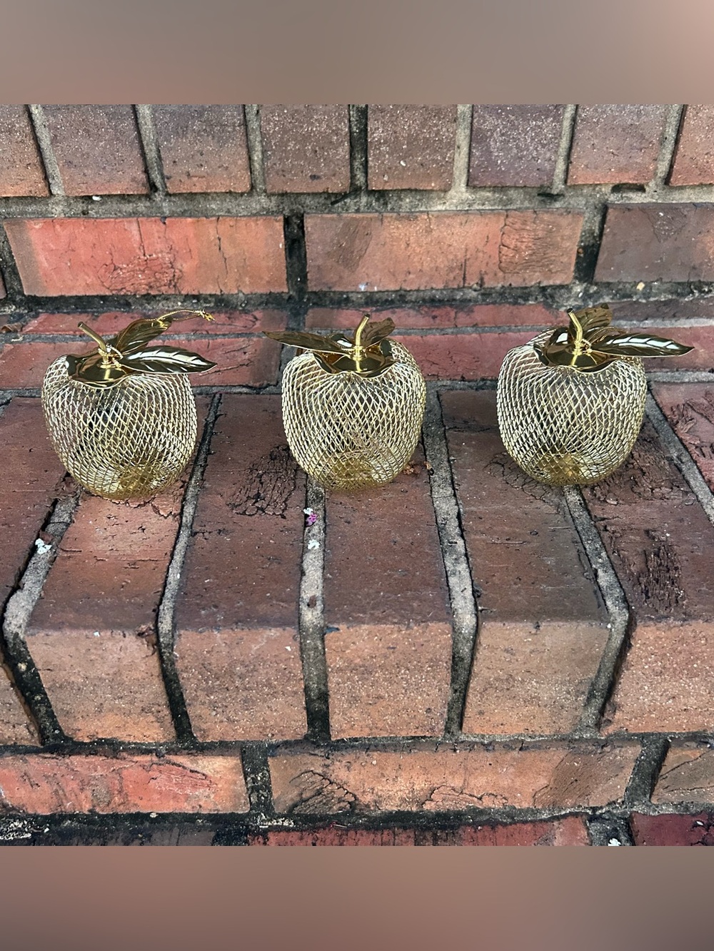 vintage gold-tone wire mesh apple ornaments or potpourri holders,